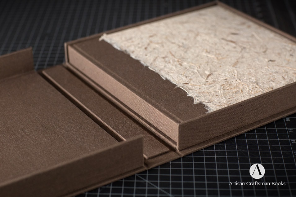 Brown bookcloth photography book with handmade paper cover